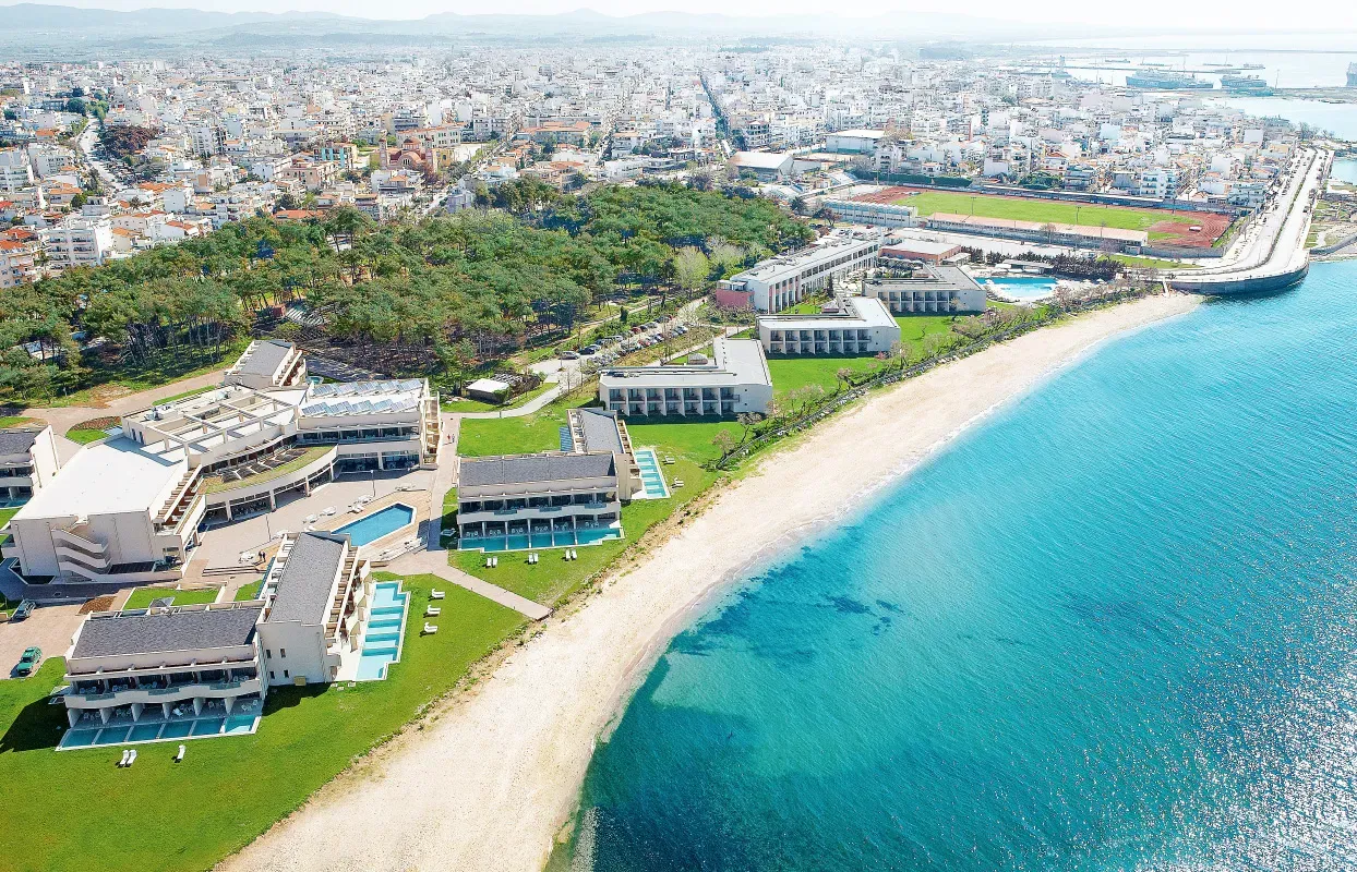 Aerial view of a beachfront hotel resort with swimming pools along the Alexandroupolis coast