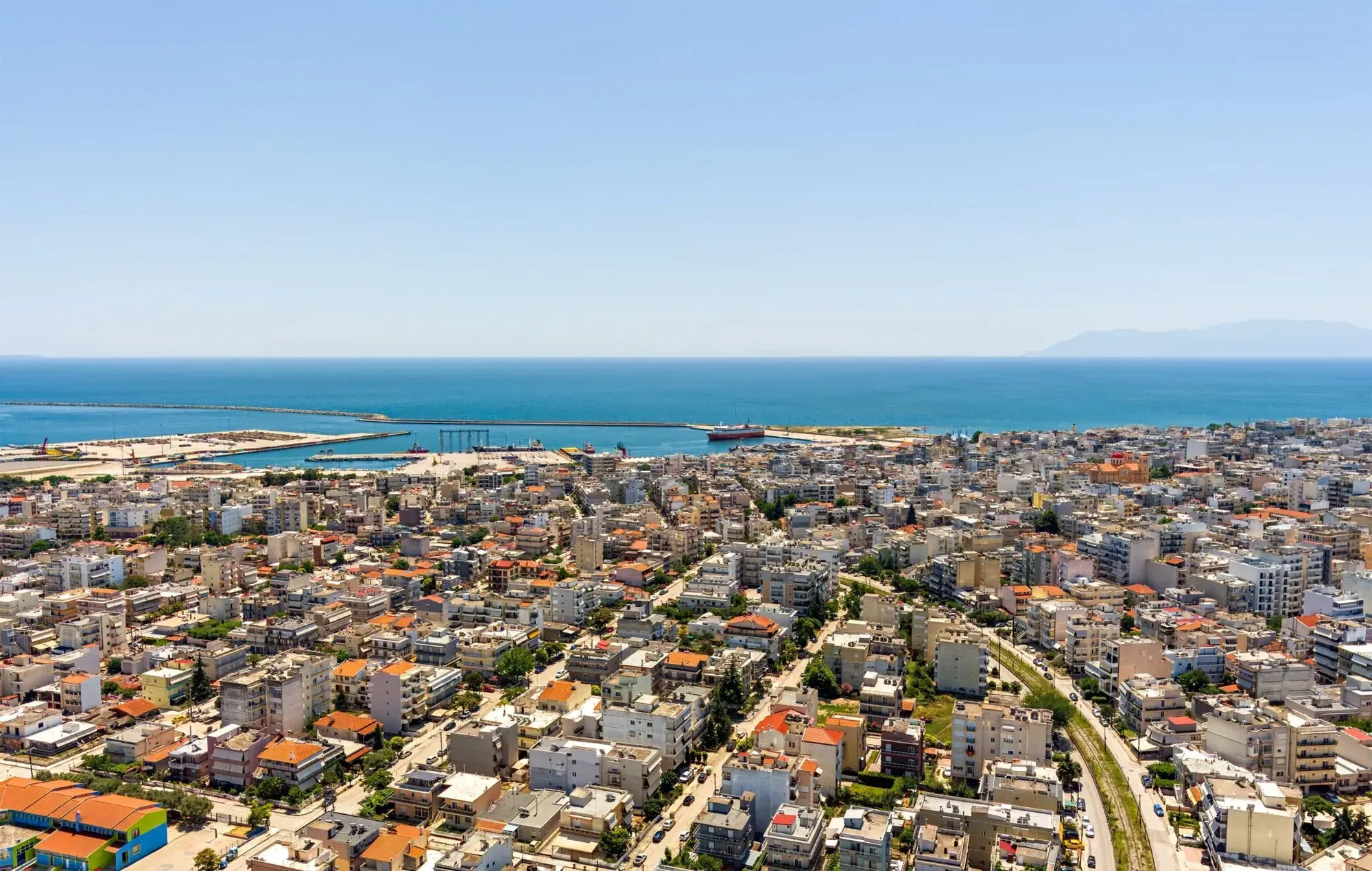 Aerial view of Alexandroupolis, its harbour, and the sea toward Samothraki