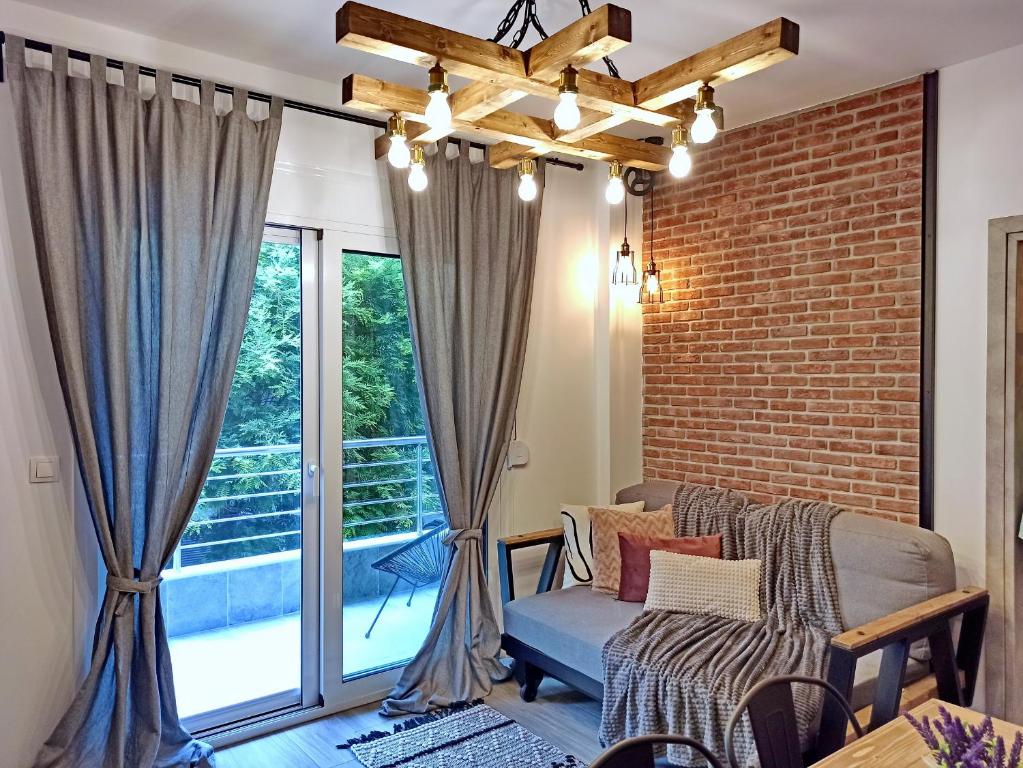 Homilis Plus — photo